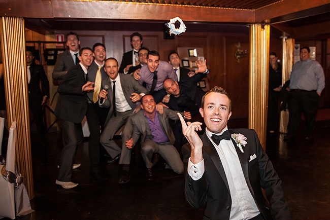 Video: Another groom really goes in on his bride during garter
